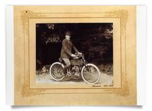 Postcard: Alexander Girardi on a motorcycle