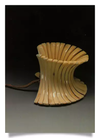 Postcard: Whale tooth bracelet